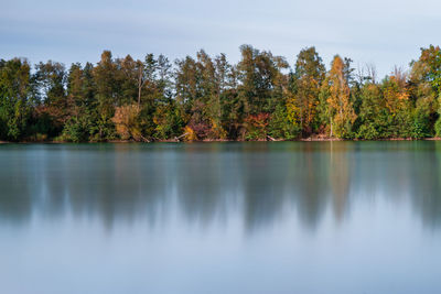 Scenic view of lake against sky during autumn