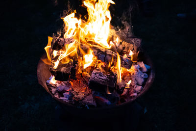 High angle view of bonfire at night