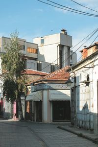 View of buildings in city against sky