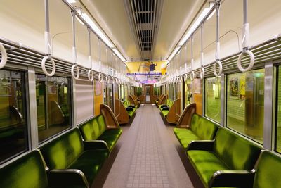 Train in empty subway station