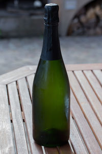 Close-up of beer bottle on table