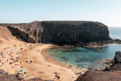 Scenic view of beach against clear sky