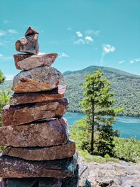 Stack of rocks against sky