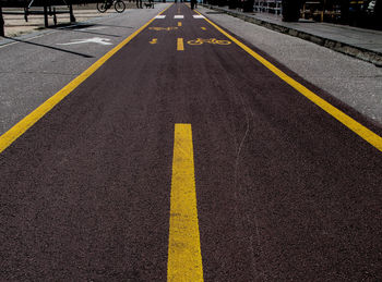 Yellow arrow symbol on road