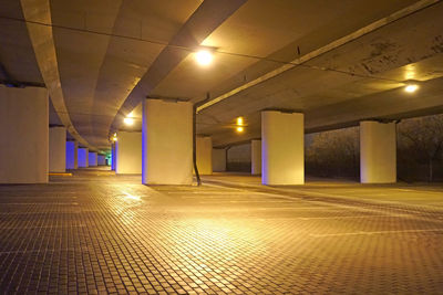 Empty illuminated subway station