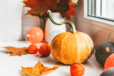 Autumn decoration on the windowsill in the style of hygge