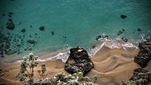 High angle view of rocks on beach