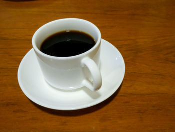 Close-up of coffee cup on table