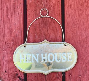 Close-up of text written on wooden door