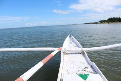 Boat on sea against sky