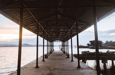 Pier over sea against sky