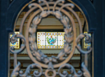 Close-up of ornate window in building