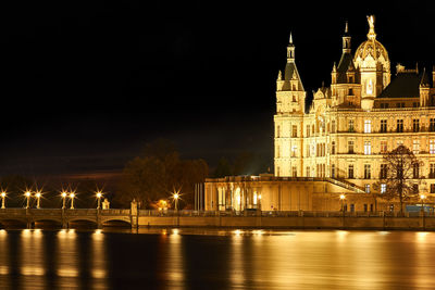 View of illuminated city at night