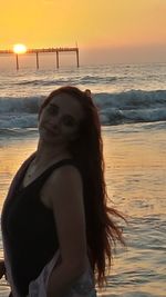 Scenic view of sea at sunset