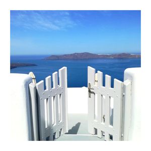 Scenic view of sea against blue sky