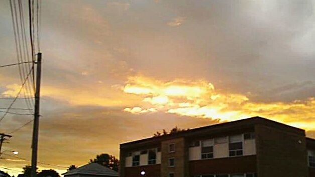 LOW ANGLE VIEW OF CLOUDY SKY DURING SUNSET