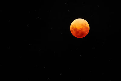 Scenic view of moon against sky at night