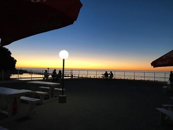 View of beach at sunset