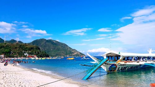 Scenic view of sea against blue sky