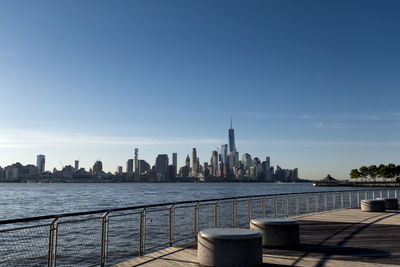 Modern buildings in city against sky