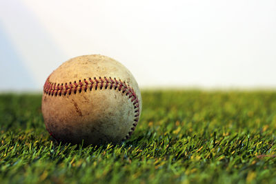 Close-up of ball on grassland