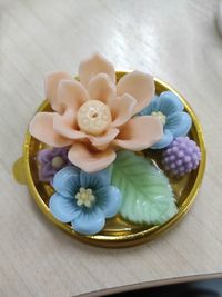 Coconut milk jelly that high angle view of various flowers in plate on table