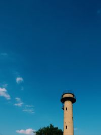 Low angle view of water tower against sky