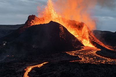 Volcano eruption explosion and lava flow in fagradalsfjall, reykjanes peninsula, iceland