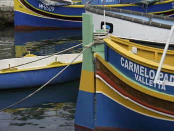 Fishing boat moored at harbor