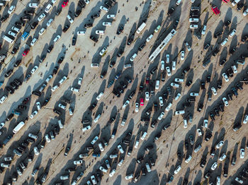 High angle view of cars parked on road in city