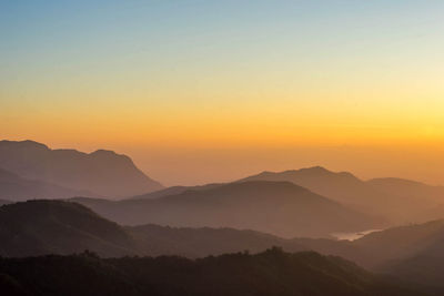 Landscape nature beautiful sunrise on top of thailand mountain