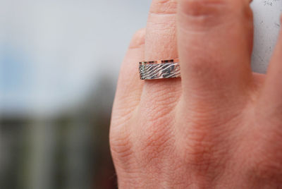 Cropped hand of woman with ring