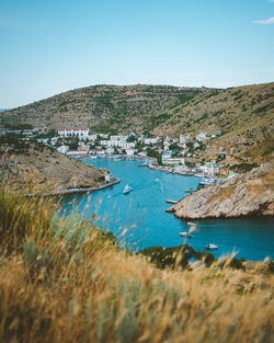 Scenic view of sea against clear blue sky
