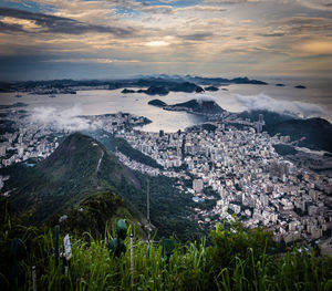 Aerial view of townscape against sky during sunset