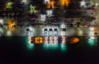 Digital composite image of illuminated city at night