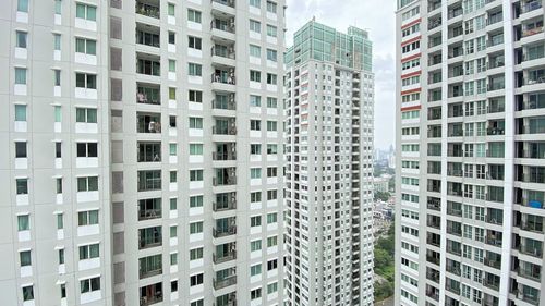 Low angle view of modern buildings in city