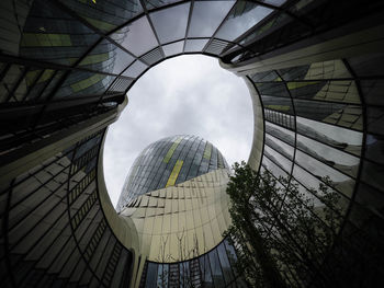 Low angle view of modern buildings against sky