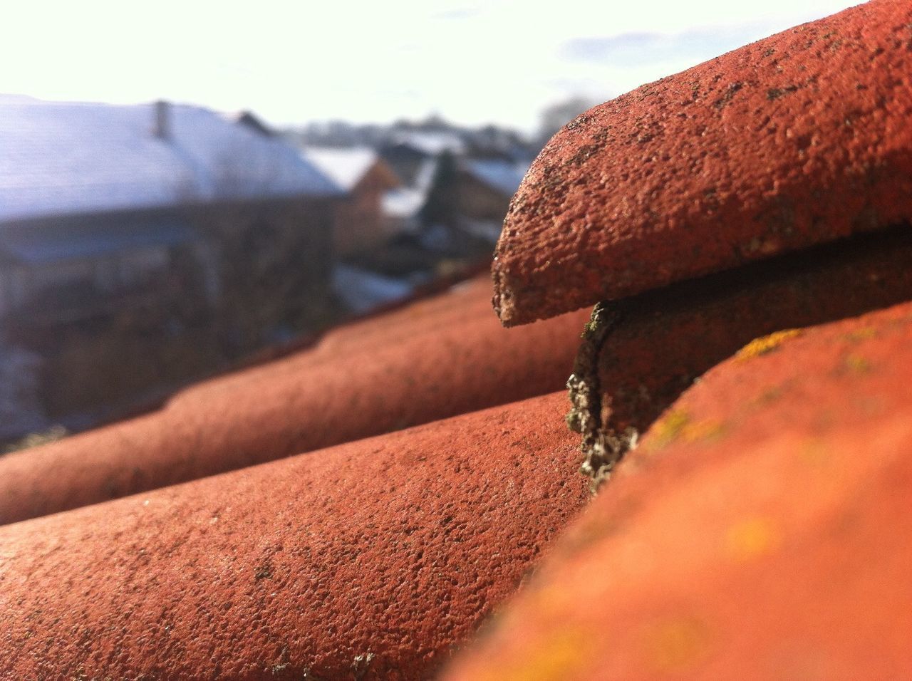 built structure, architecture, building exterior, wall - building feature, low angle view, brick wall, close-up, focus on foreground, wall, outdoors, day, selective focus, sunlight, part of, shadow, house, no people, textured, old, cropped