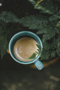High angle view of coffee cup on table