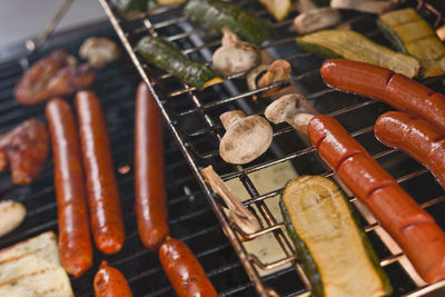 High angle view of food cooking on barbecue grill