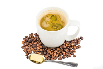 Close-up of coffee cup against white background