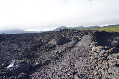 Panoramic view of volcanic landscape against sky