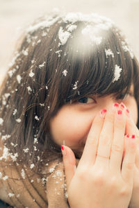 The woman smiling in the snow 