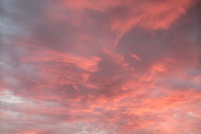 Low angle view of dramatic sky during sunset