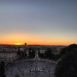 Cityscape against sky during sunset