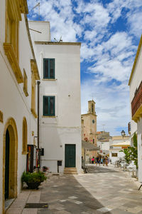 A narrow street among the old houses in the historic center of otranto, a town in puglia in italy.