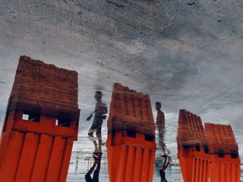 Low angle view of buildings against sky during winter