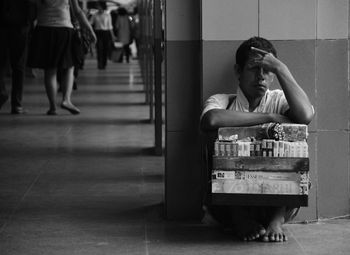 Man sitting on flooring