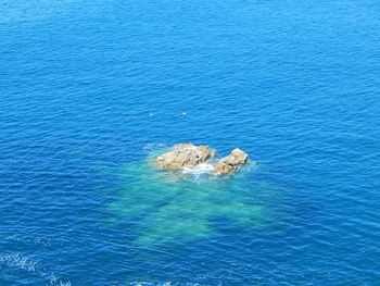 High angle view of blue sea