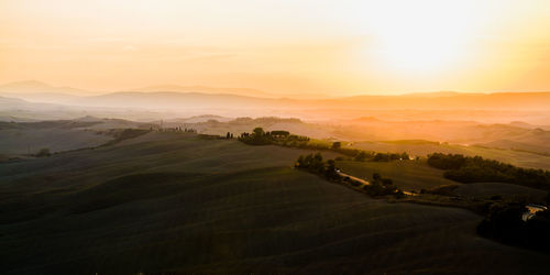 High angle view of idyllic rural landscape at sunset